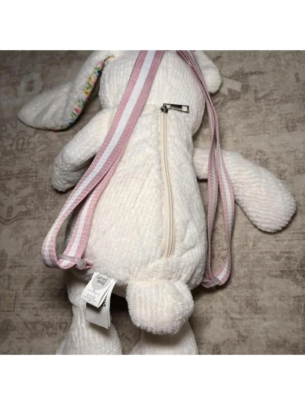 Carried Away White Plush Bunny Backpack with Floral Lined Ears and Pink Straps
